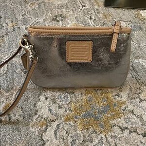 Coach 2015 Silver Wristlet with Tan Trim